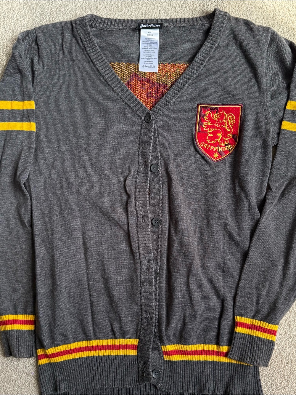 Harry Potter Warner Bros. Gray V-Neck Sweater with Red and Yellow Knit Detail